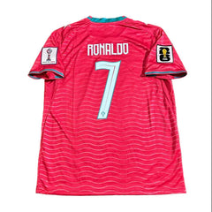 Red sports jersey with 'Ronaldo' and number '7' on a grass background