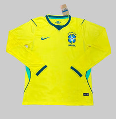 Yellow soccer jersey with Nike logo on a green background