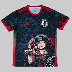 Black and red t-shirt with anime character design on a green surface