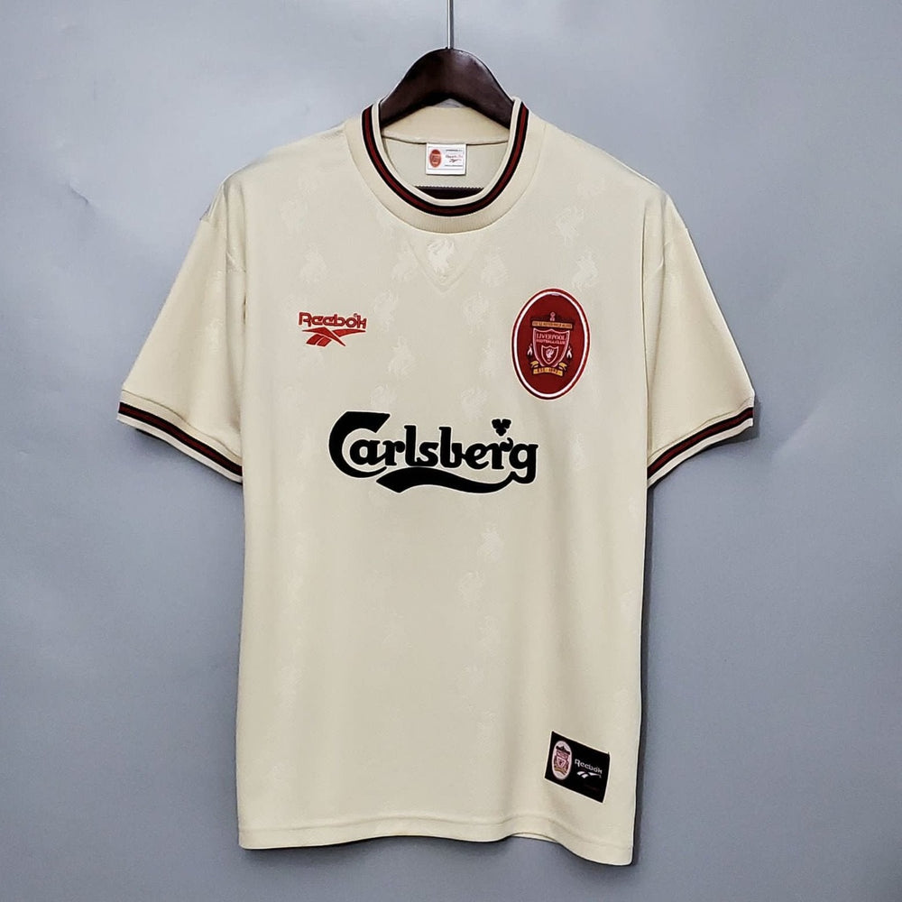 Liverpool 1996-97 Away Retro Jersey in ecru color with green collar, displaying the Carlsberg sponsor logo and the Liverpool FC crest.