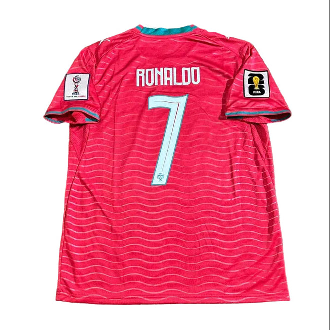 Red sports jersey with 'Ronaldo' and number '7' on a grass background